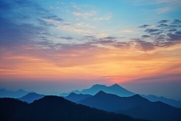 Mountain silhouette sunset sky landscape.