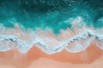 Turquoise ocean water creating white wash on pink sand beach shore