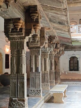 Stoen carved pillars of the 18th century Bagore ki Haveli in Udaipur, Rajasthan