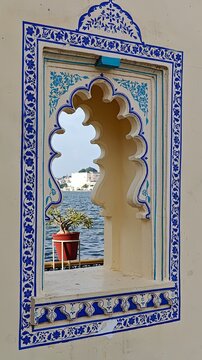 Overlooking Lake Pichola in Udaipur through the Jagamandir Palace window 