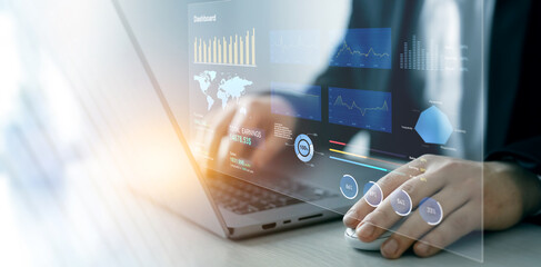Management data System KPI connected in database for follow earnings,operations and sales data.Financial business data analytics graph dashboard. Businessman using KPI dashboard.