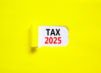 Planning tax 2025 new year symbol. Concept words Tax 2025 on beautiful white paper. Beautiful yellow paper background. Business tax 2025 new year concept. Copy space.