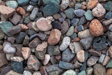 Close-up of small stones as nature background. Copy space. Stones on railway embankment
