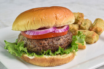 portobello burger  serve with  broccoli tots