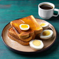 Fototapeta premium Kaya Toast with Butter and Soft Eggs
