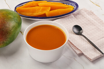 Sweet mango puree in the bowl
