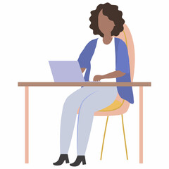 Woman working on laptop at desk