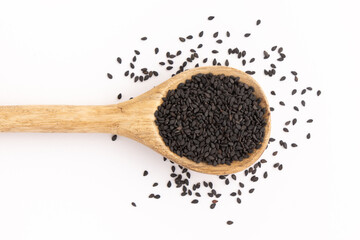 black sesame in spoon isolated