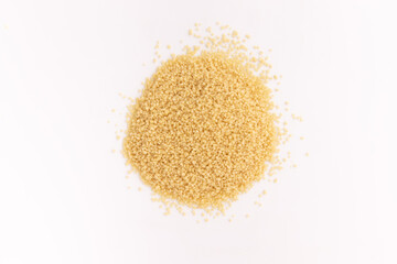 dry couscous isolated on white