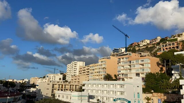 Time-lapse. Wind blows clouds over the city of Santa Ponsa. Mallorca Island. Spain.