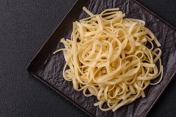 Rice noodles with beans, meat, tomato sauce, spices and herbs