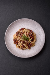 Rice noodles with beans, meat, tomato sauce, spices and herbs