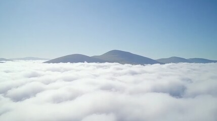Serene Mountains Above a Sea of Clouds