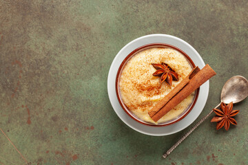 Curau de Milho (Brazilian Corn Pudding). Traditional Brazilian dessert. Corn porridge with cinnamon...