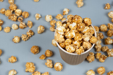 Sweet caramelized popcorn in a bucket.