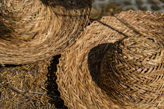 Close-up of a stack of Traditional Georgian straw hats on the street market, Tbilisi, Georgia