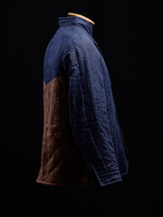 Historical fashion. Medieval knight cloth. Padded jacket gambeson.