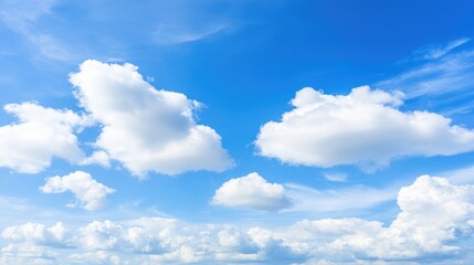 Obraz premium Bright and Fluffy White Clouds in a Blue Sky