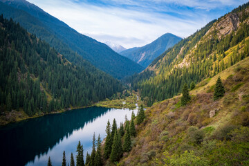 Fototapeta premium Alpine lake Kolsai in Kazakhstan. Beautiful mountain natural landscape.