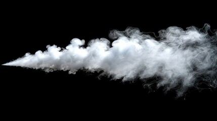 A dramatic plume of white smoke billows against a dark background during a nighttime display