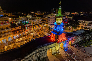 Beautiful Aerial view of the walled city of Cartagena de Indias in Colombia. Its Clock Tower entrance, the plaza, the sanctuary and the Domus Dei at night