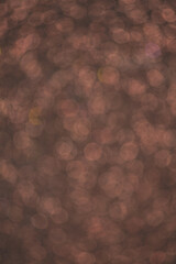 Shiny brown glitter luxury background, blurry sparkling lights texture, perfect for backgrounds, textiles, wallpapers