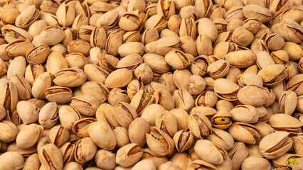 Tasty pistachios isolated on a white background.