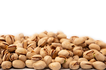 Tasty pistachios isolated on a white background.