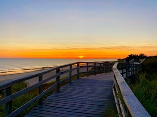 Naklejka premium pier at sunset on the island of Ile de Re in France