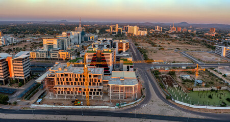 multistory building in construction, developments in CBD Gaborone Botswana, street view