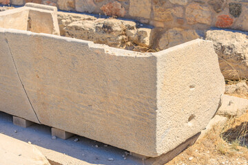 A large stone slab with a hole in it, Acropolis in Athens