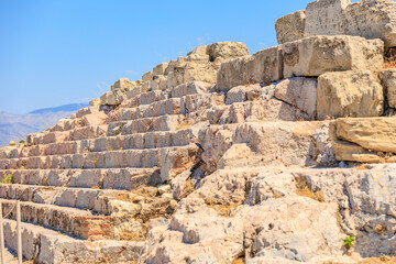 A large stone wall with a few steps, Acropolis in Athens