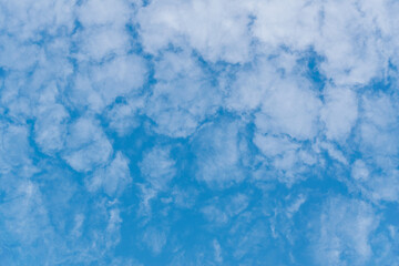 White cloud texture with blue background in hectagon pattern