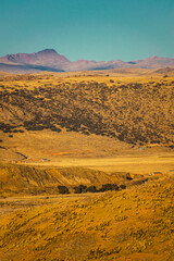 Snow mountain in a sunset with clouds and blue sky in the Andes mountain range