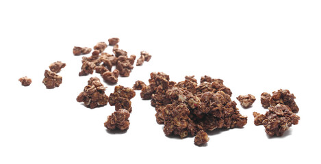 Crunchy granola, muesli pile with chocolate isolated on white background, side view