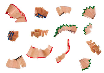 Wooden pencil shavings on isolated background, top view