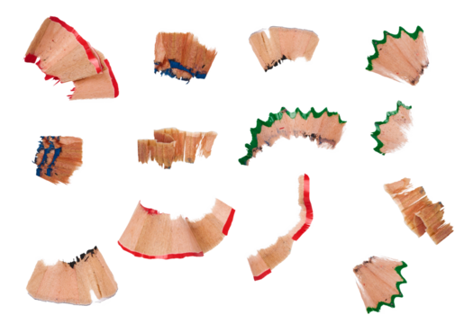 Wooden pencil shavings on isolated background, top view