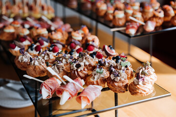 Assorted gourmet appetizers and desserts on display, luxury events, catering, and celebrations