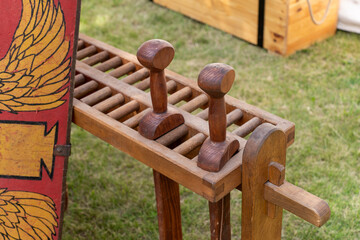 Wooden ancient Roman practice swords, gladius in a military camp