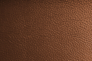 Natural, genuine orange leather with metallic effect, texture of glossy leatherette background
