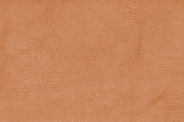 Natural, genuine orange leather texture, structure of matte leatherette macro background