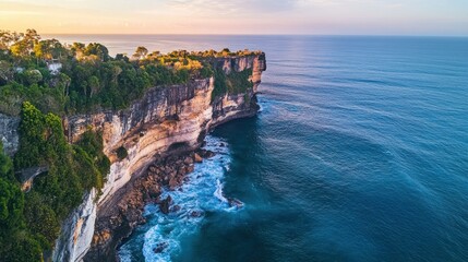Cliffside Overlooking The Ocean With Foamy Waves Breaking