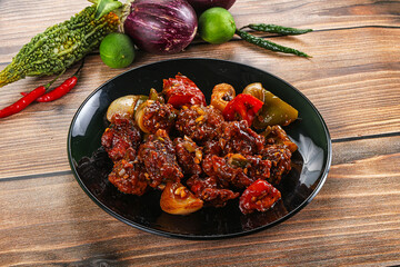 Asian cuisine - pork with chili sauce