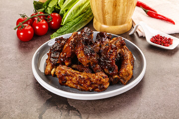 Grilled pork ribs in barbecue sauce