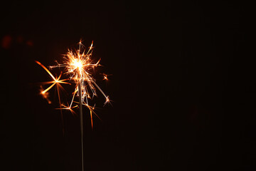 Beautiful Christmas sparkler on black background