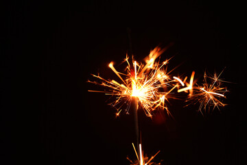 Beautiful Christmas sparkler on black background