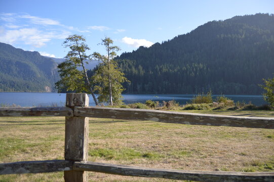 Lake with Mountains and Fence