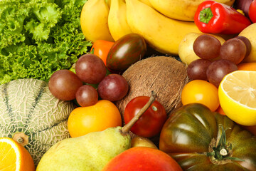 Many different fruits and vegetables as background, closeup