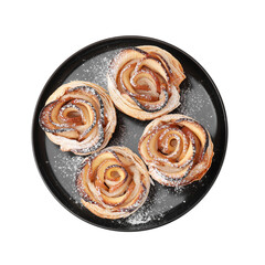 Freshly baked apple roses isolated on white, top view