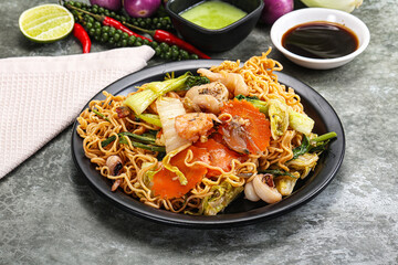 Asian cuisine - Fried noodles with seafood